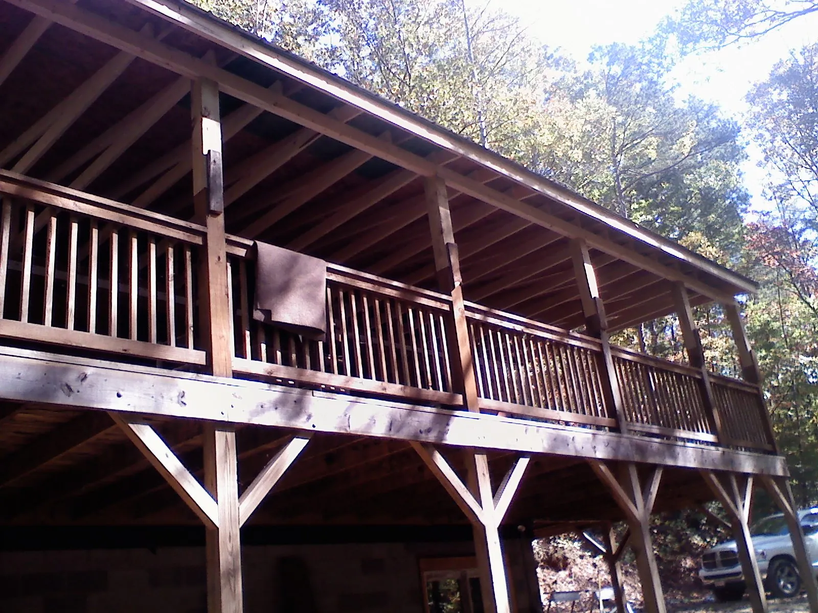 Timber framing under a new elevated porch and deck — Roof Leak Repair in Lewisburg by Roofing Brothers